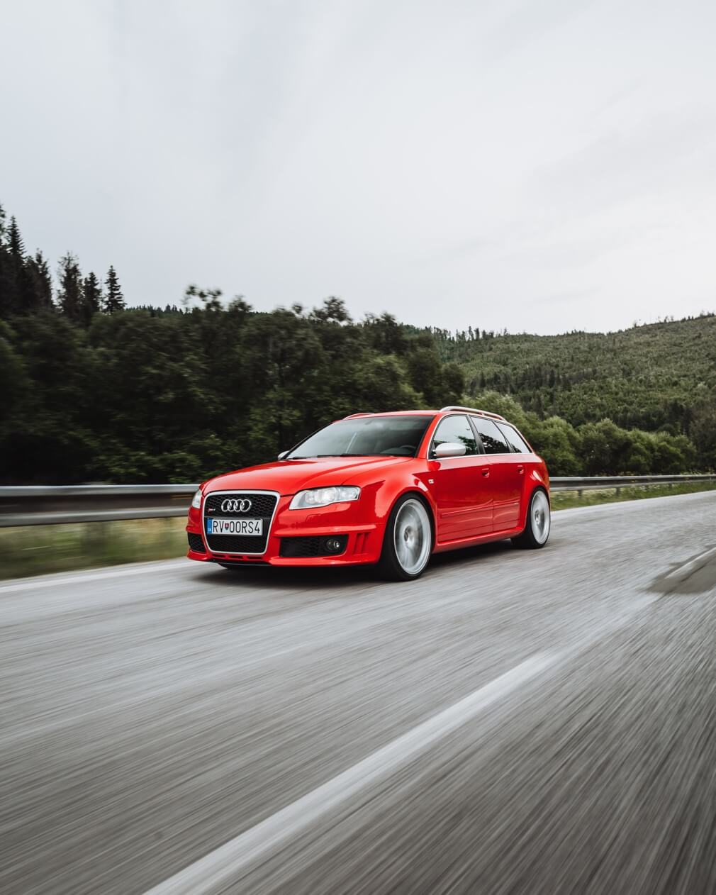 red_audi_driving